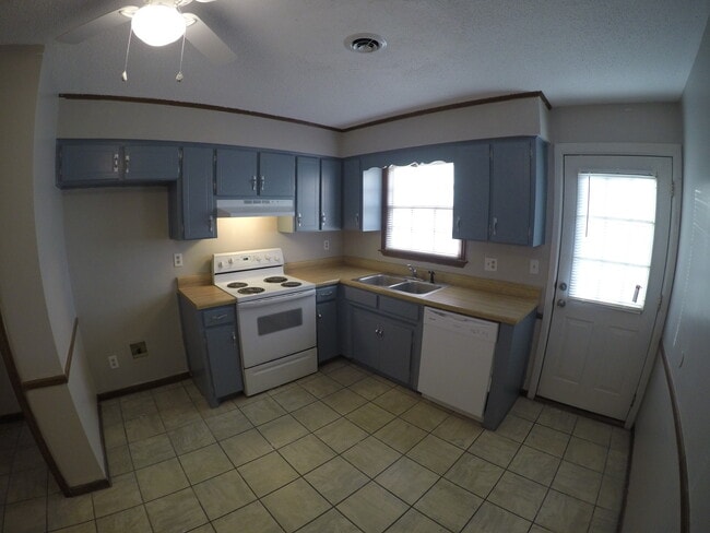 Freshly Painted Kitchen Cabinets, New Dishwasher, New Stove Hood. - 1536 E Blackstock Rd