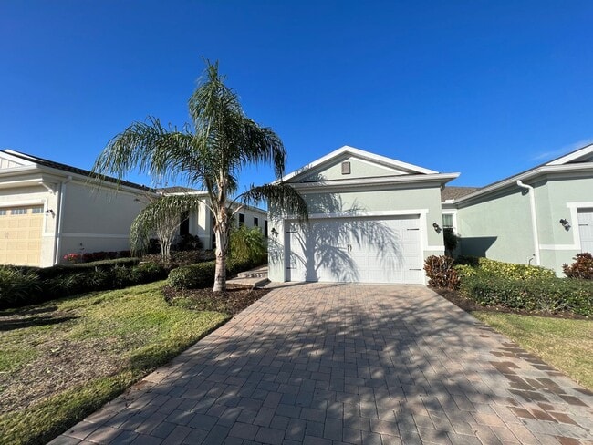Building Photo - 55+ community in Four Seasons of Orlando 2 bedroom, 2 bathroom, with a 2 stall attached garage on...