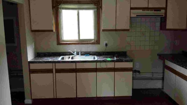 Building Photo - Three bedroom ranch with 2 car garage and large fenced in yard