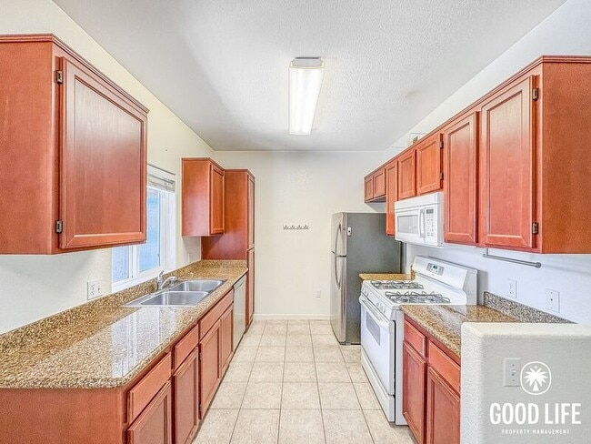 Building Photo - 7671 Mission Gorge Rd Unit #106