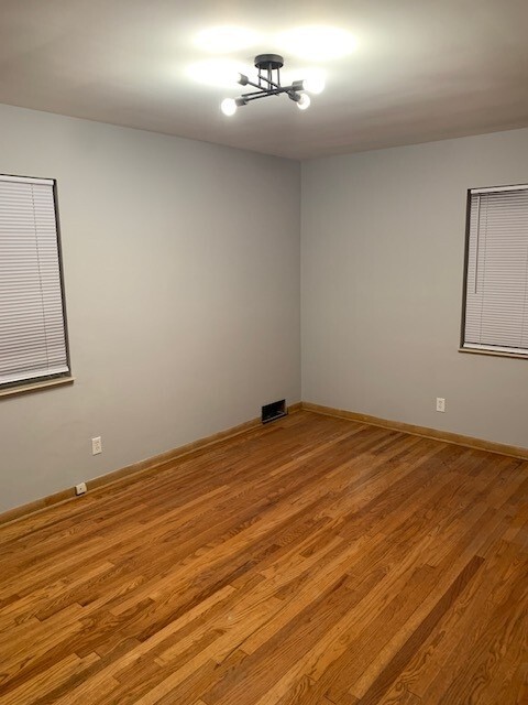 Bedroom hardwood throughout - 1721 Liberty Dr Unit 1721 Liberty Drive