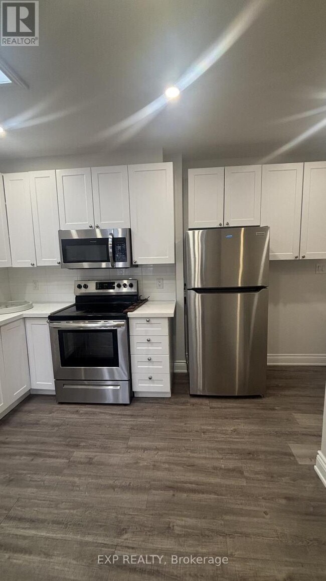 Photo - 3289 Lake Shore Blvd W Unité 1