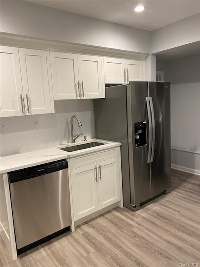 165-167 E Main St Unit 2A