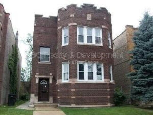 Building Photo - 9016 S Justine St Unit 1