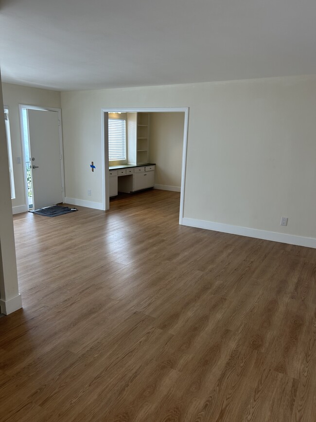 Living room looking toward den. - 1137 12th St Unit #9.    2 bedroom plus den