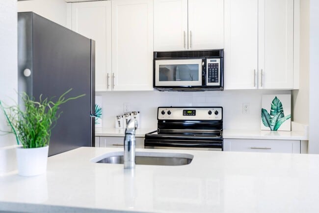 Photo - Palm Court at Wellington Apartments