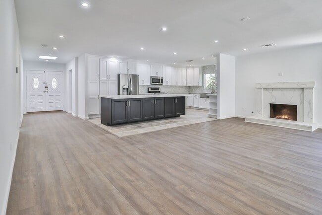 Photo - MOVE-IN READY 5BR w/pool + guest unit w/half bath!