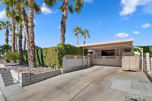 Building Photo - 73182 Palm Greens Pkwy