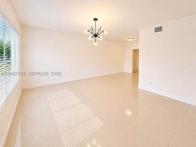 Building Photo - 1027 94th St Unit 7
