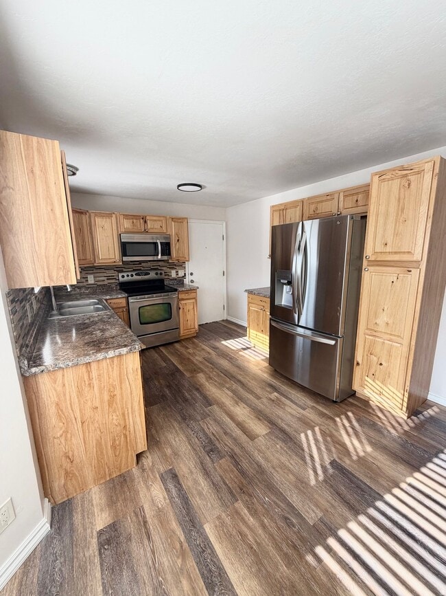 9571 S David St