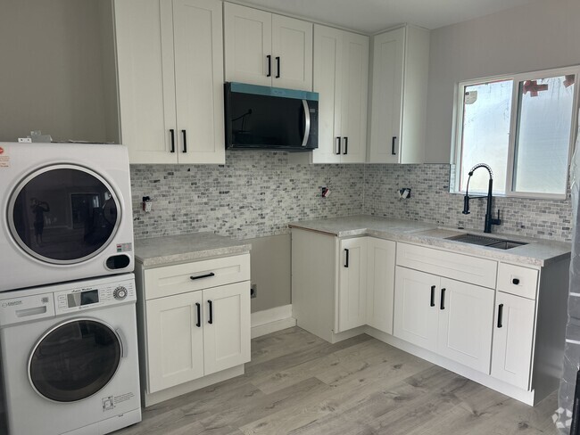 Building Photo - 5534 Santa Barbara Ave Unit New Studio Available Rental