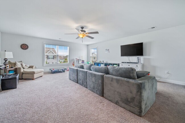 Photo - Stunning 5BR Home on Corner Lot with Upstairs Bonus Area & 2-Car Garage