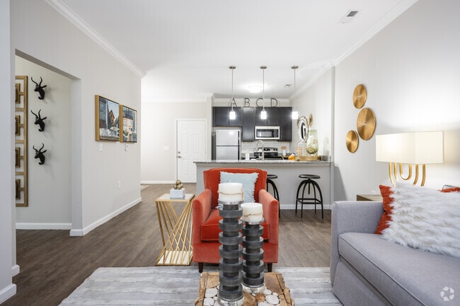 2 habitaciones, 2 baños - 1065 pies cuadrados - Sala de estar - Greymont Village Apartments