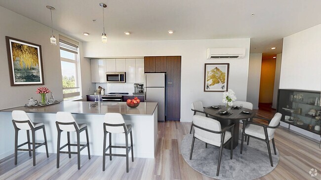 Modern kitchen with large breakfast bar - Modera Redmond Rental