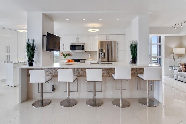 Building Photo - 4000 Towerside Terrace Unit TS12