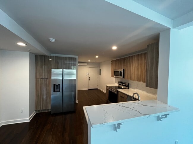 Building Photo - Busy Corner Unit 202 Rental