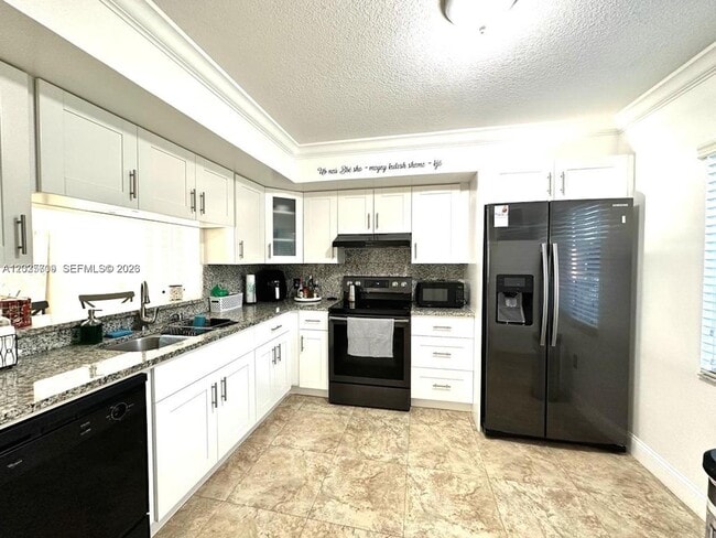 Building Photo - 850 SW 138th Ave Unit 307D