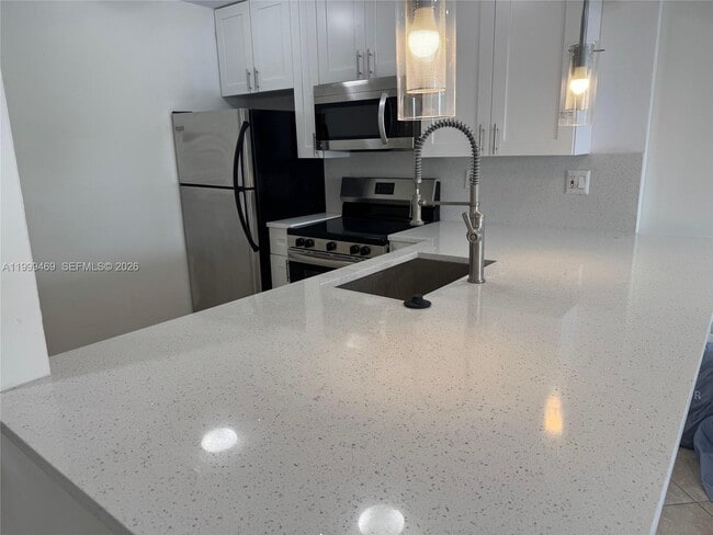 Building Photo - 492 NW 165th St Unit C-309