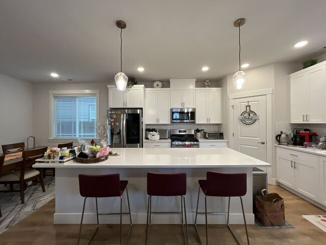 Photo - Open Concept 4BR Home with Island Seating, Loft & Spacious Living Room