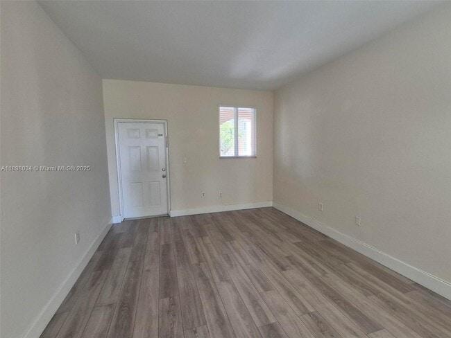 Building Photo - 17820 NW 73rd Ave Unit 201-1