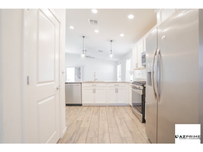 Photo - Step Into Unrivaled Comfort And Style With This Like-New 3/2 Phoenix Gem.