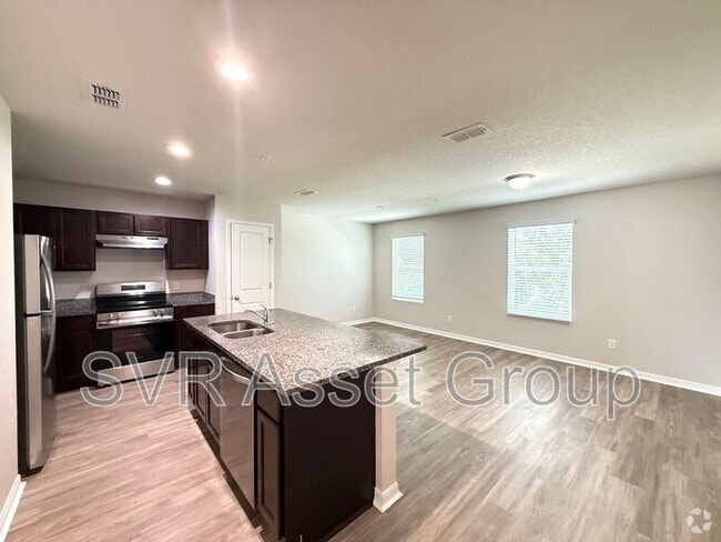 Building Photo - 6468 Sweetbay Ln Unit 102 Rental