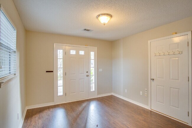 Photo - Live the Gulf Breeze Waterfront Life – Dock, Canal Access & Boat Lift!