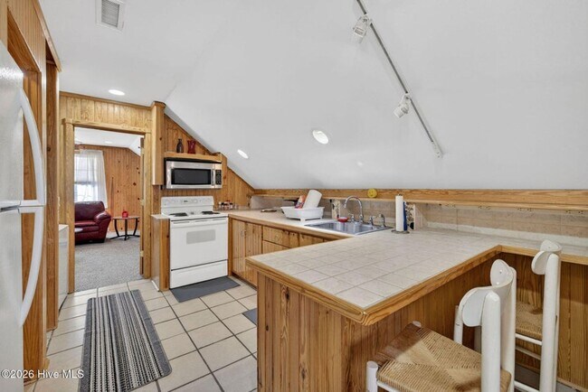 Photo - UNIQUE FURNISHED APARTMENTS WITH CUSTOM WOODWORK Unidad Upstairs -  A