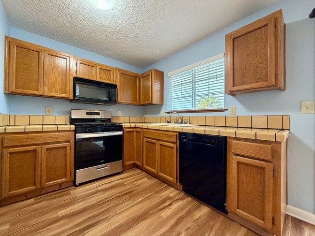 Photo - Bay Views! Pet Friendly! 3/2 with 2 Car Garage. Minutes from town