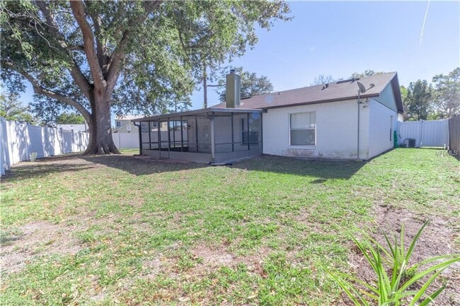 Photo - Freshly Painted 3/2 with Fenced Yard & Fireplace!