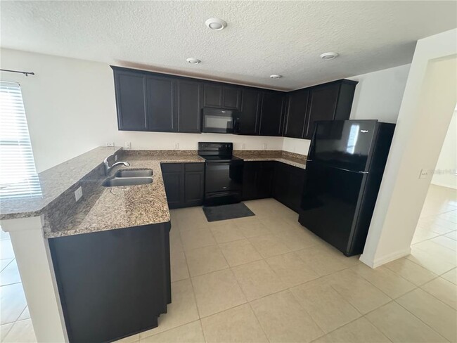 Photo - 6909 Crested Orchid Dr