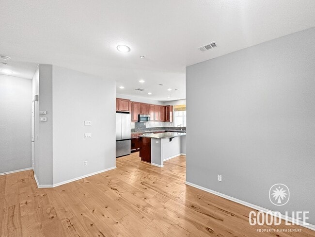 Photo - Elegant 3BR Residence in Exclusive Gated Community w/ AC & Garage!