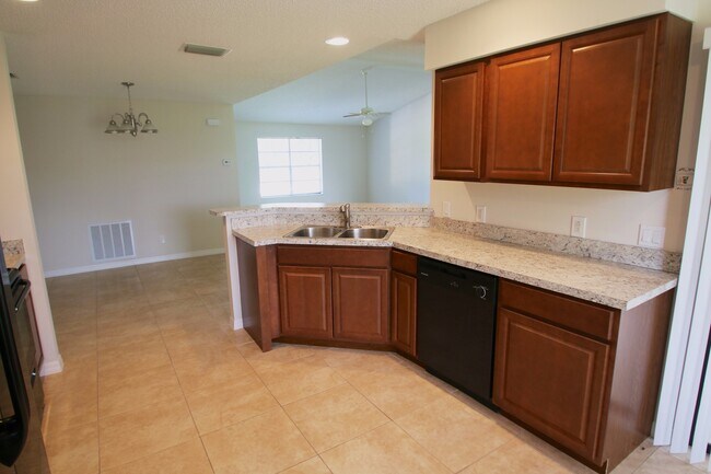Photo - Spacious 3BR/2BA Home | Large Yard | Lawn Care Included | Prime Port St. Lucie Location
