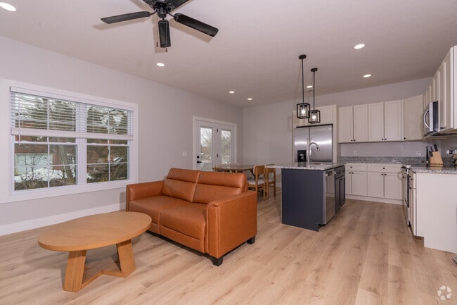 3BR, 2.5BA - 1,460SF - Living Room - Ridge Pointe Duplexes