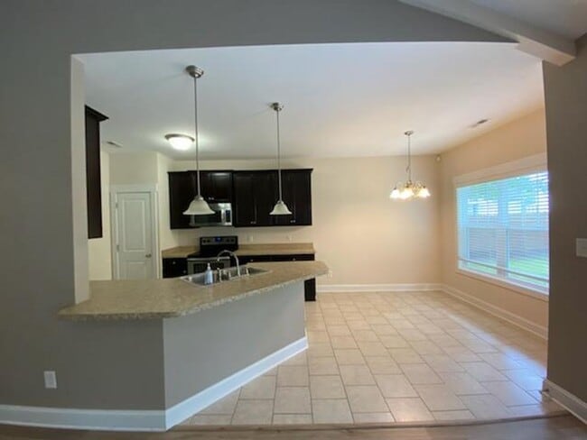 Photo - 3 Bed, 2 Bath unfurnished home with Bonus room in Escoba Bay!