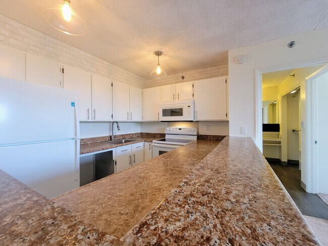 Photo - Available now | 1 bed, 1 bath mid-floor condo with open mountains views at Pearl Regency Unit 1213