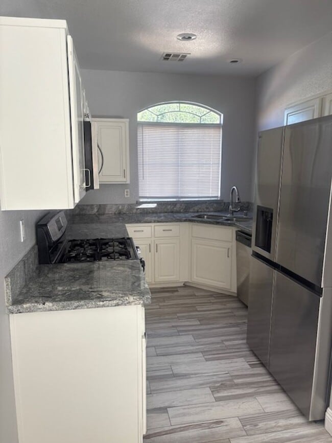 Photo - one story house with 3 bedrooms