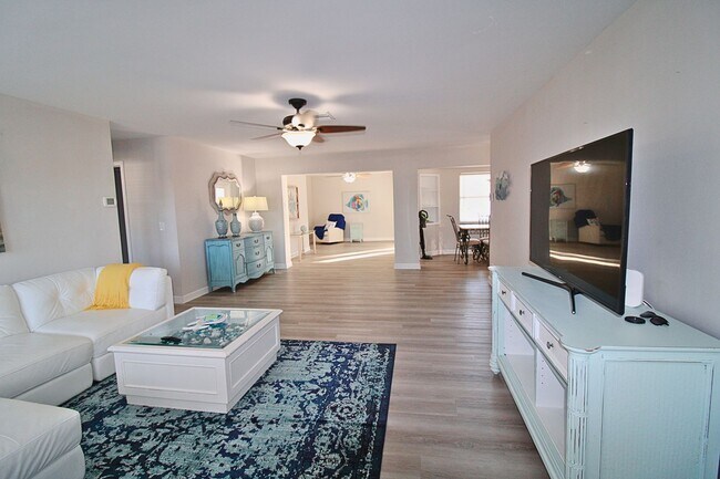 Photo - Spacious 3BR Home with Garage, Fenced Yard & Covered Patio in Seminole