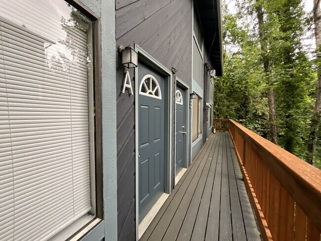 Photo - Comfortable 2 Bedroom Retreat with a Beautiful Tree-Lined Setting, Washer/Dryer & Modern Kitchen Unit #A