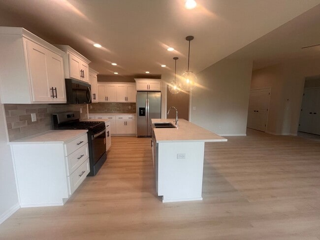 Photo - Beautiful, brand-new, 3-bedroom, 2-bath home in Nixa with a 3-car garage.