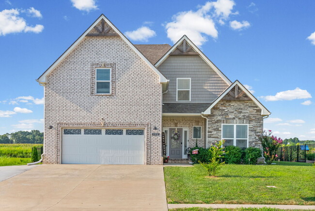 Building Photo - Stunning 4-Bedroom/ 3 Full Bath Clarksville Retreat with Granite Elegance & Cozy Fireplace!"