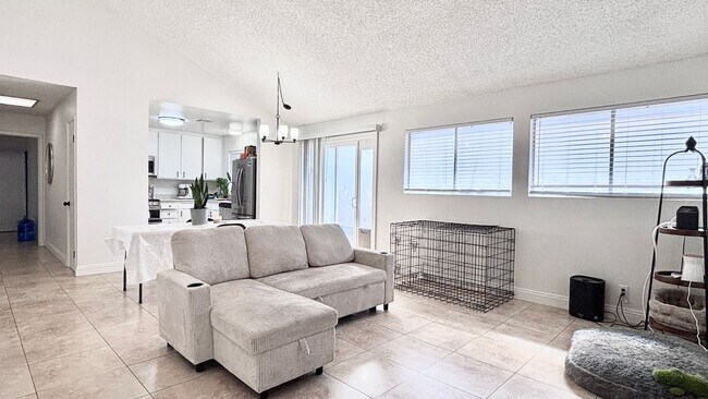 Photo - Fantastic 4 bedroom home with a 1 car garage and driveway space for additional car! Backyard and ...