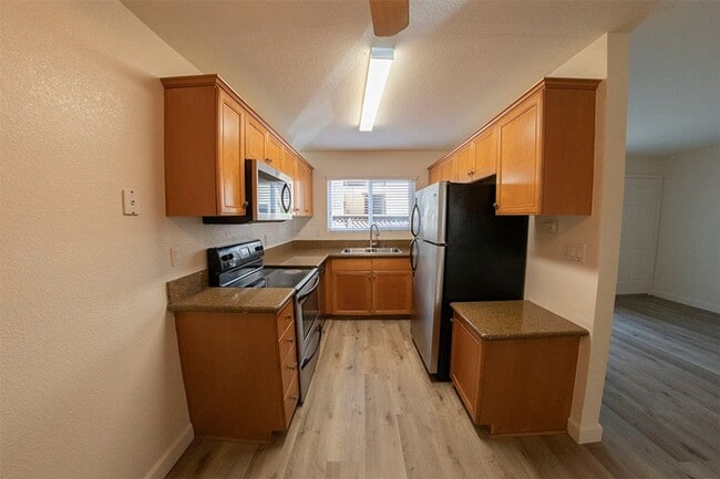 Photo - 2BR/1BA Clairemont Condo Freshly Painted, New Vinyl Plank Flooring Throughout Patio, 1 Parking Space