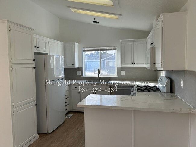 Photo - Spacious 3-Bedroom 2-Bath Home  with Fireplace, Fenced Yard, and Attached Garage