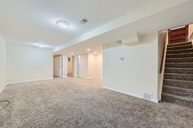 Photo - Great location! Updated 3Bed/2Bath Ranch with full basement, wood floors, and large fenced-in-yard!