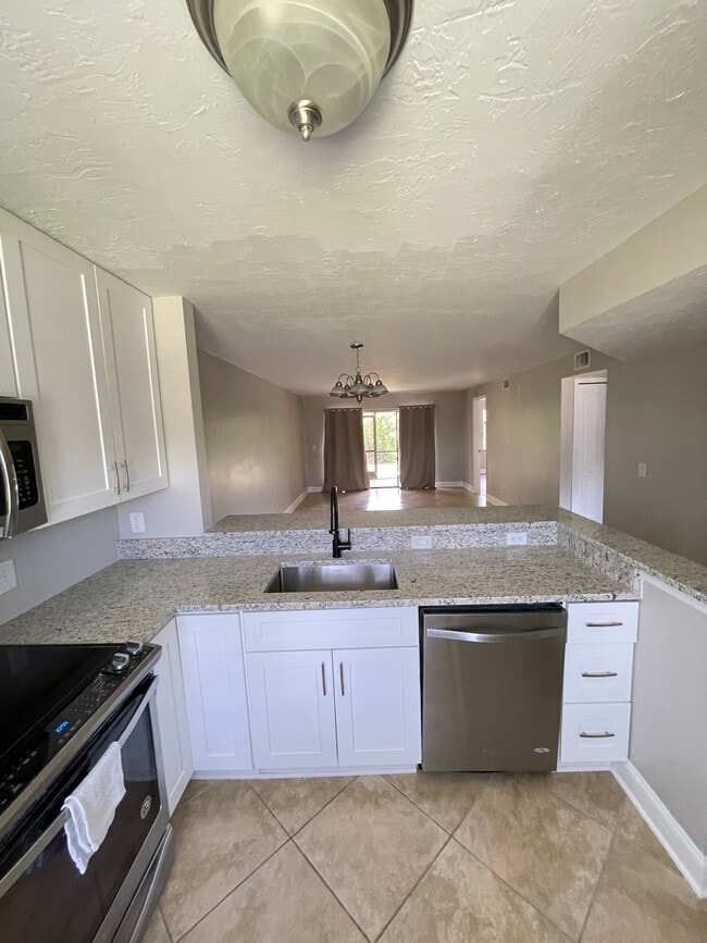 Building Photo - 1211 Rosemary Ct Unit 104 Rental