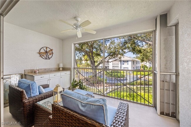 Building Photo - 7050 Barrington Cir Unit 202