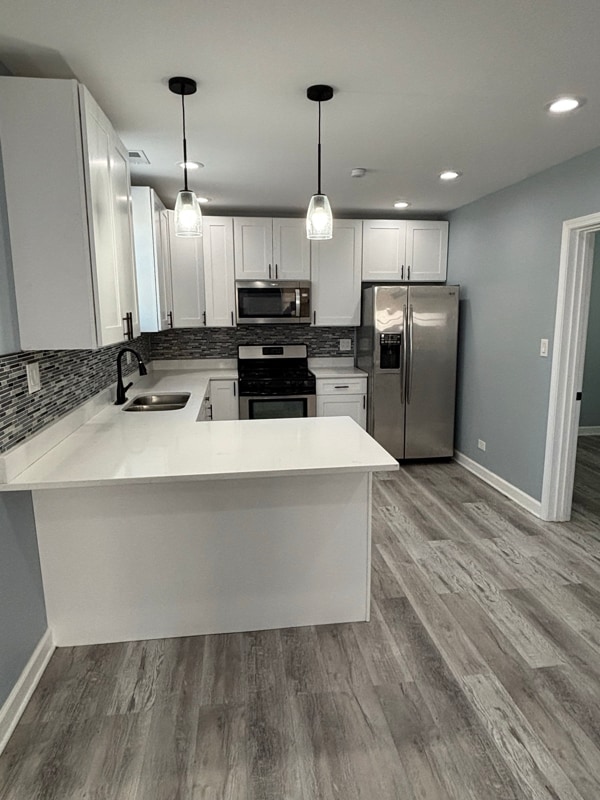 Photo - 3109 W Arthington St Unidad 2 rear back