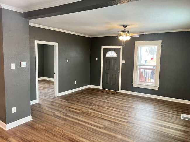 Living room/front door - 1102 Range Line St House