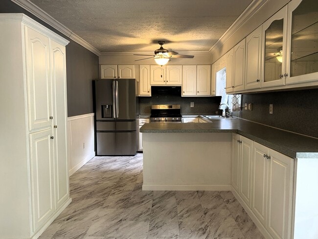 Photo - Charming Split-Level Home with Spacious Yard & Modern Updates – Ideal Location!